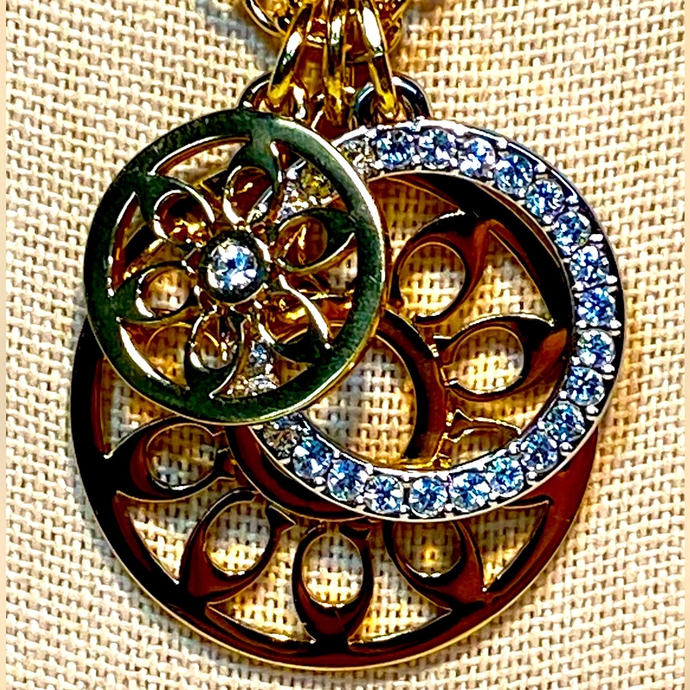 Coach Multi Circle Gold Tone & Pave Pendant Necklace.